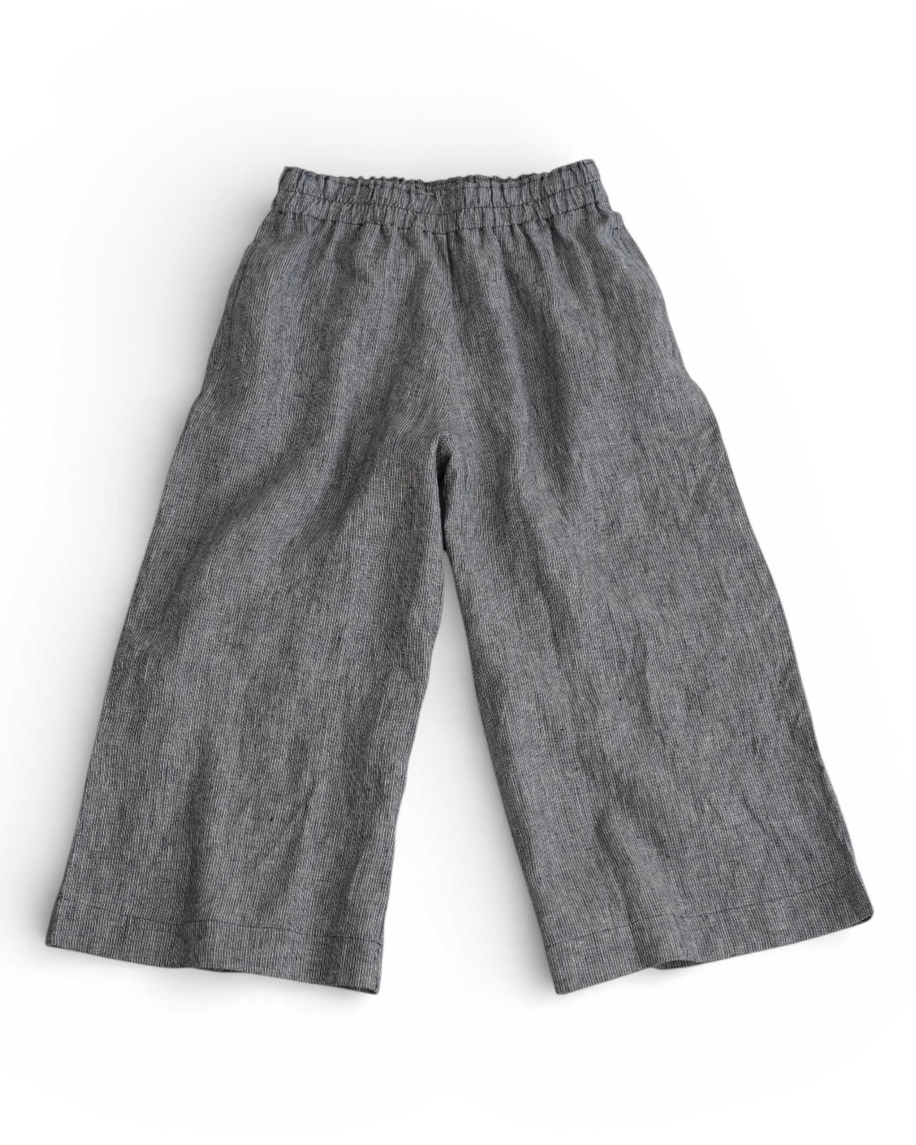 The Linen Culottes No.11 in Cooke's Stripe by Pyne and Smith Clothiers feature a wide-leg design, soft European flax linen, and an elastic waist, shown laid flat on a white background.