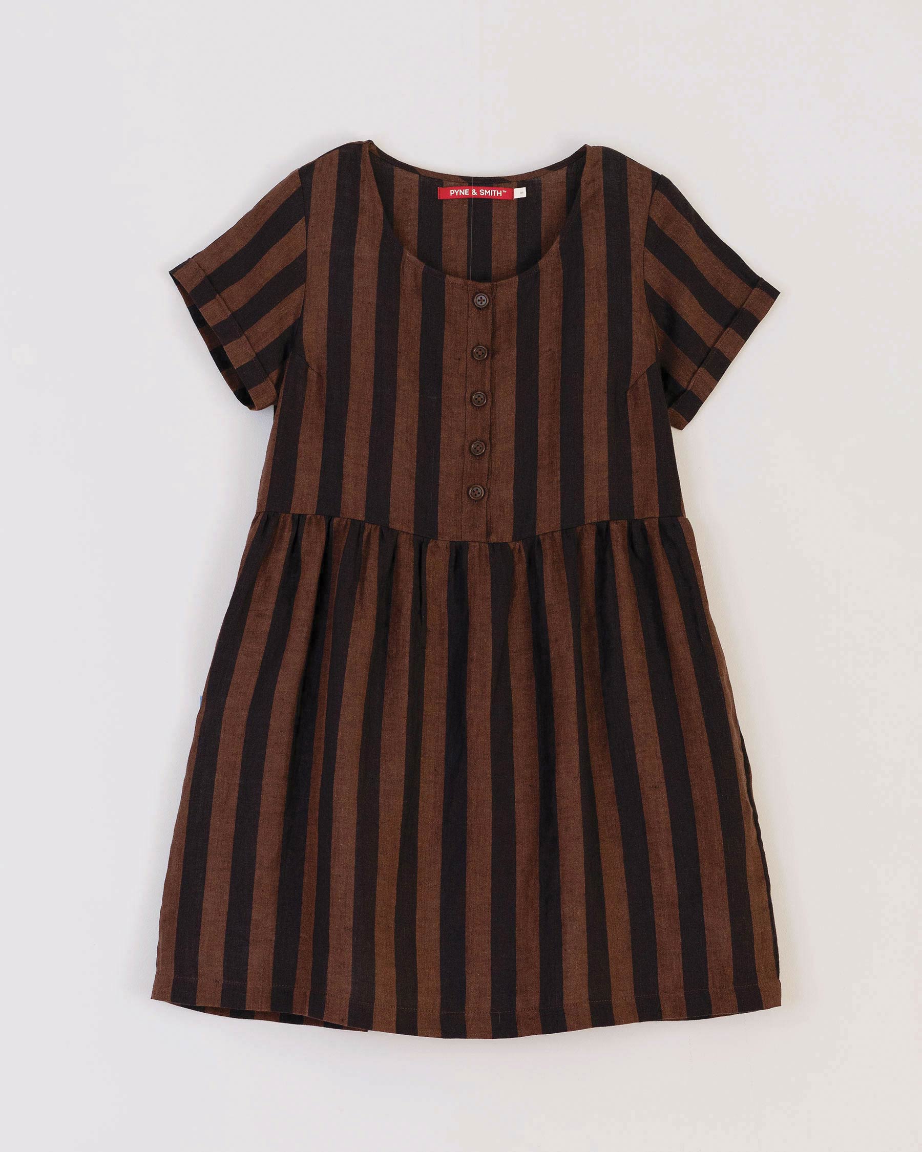 Flat lay of button up linen dress in cocoa and black stripe with pockets