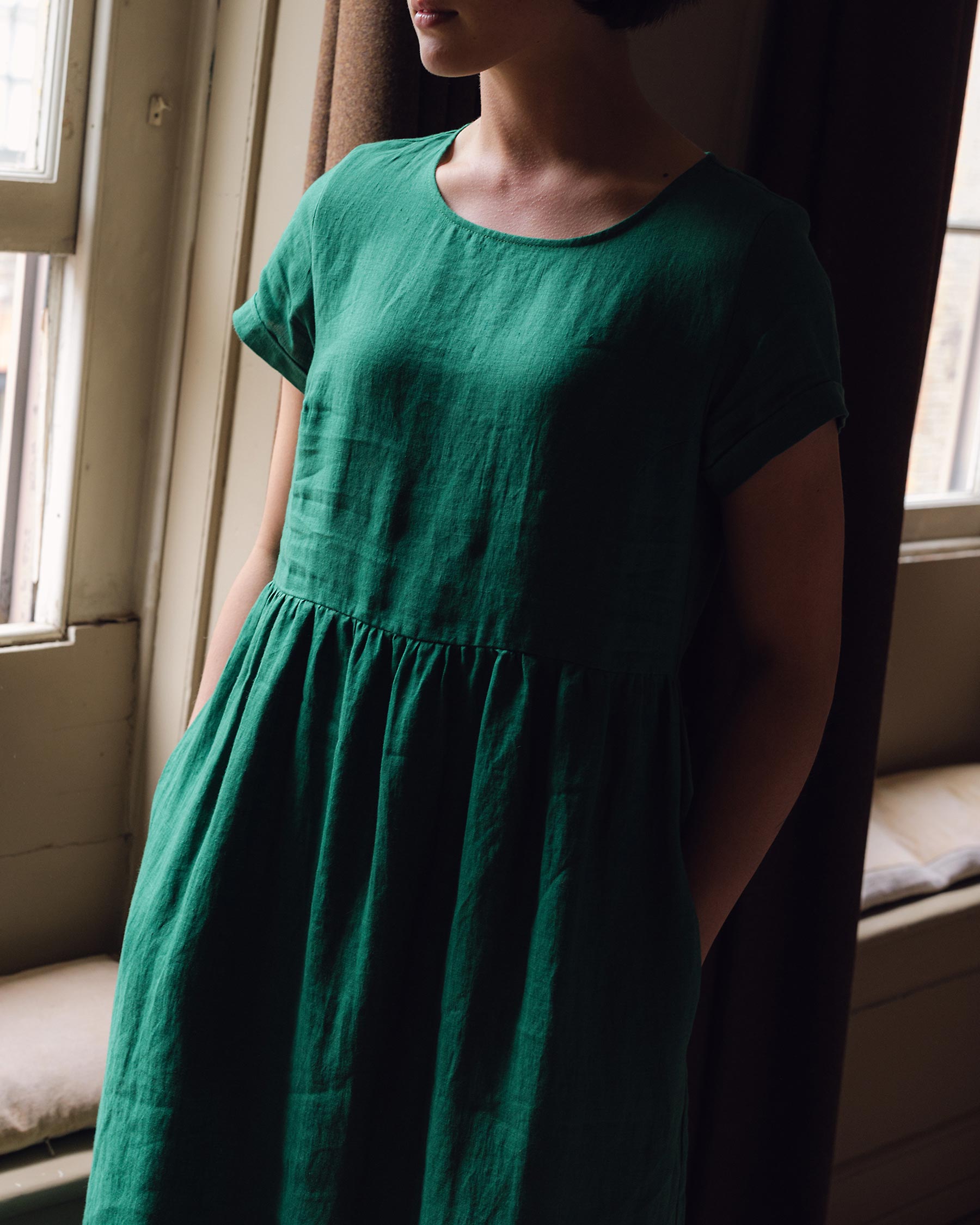 full length linen tea dress in viridian green with pockets